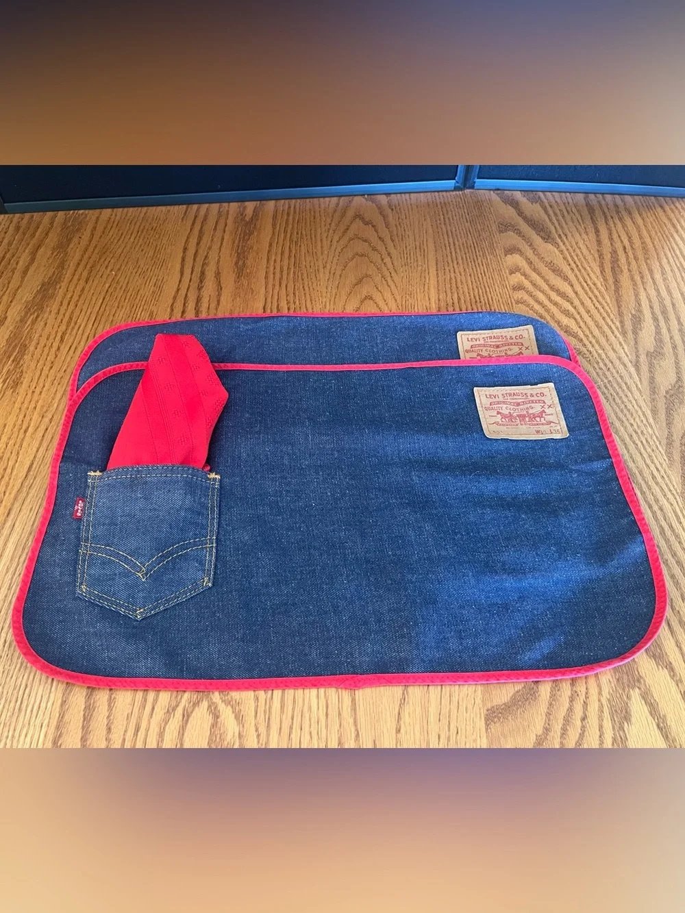Two Levi's Blue Denim Placemats with Red Trim and Napkins